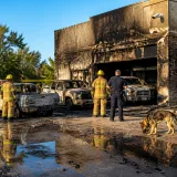 Ex-NFL player arrested after fire at Florida business; company vehicles, building damaged