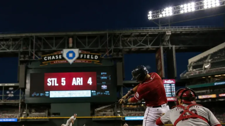 Cardinals edge Diamondbacks 5-4 after late sac fly, Carroll’s eighth-inning homer ties it